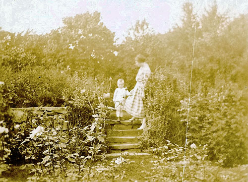 kidder-1-sm Lady and young boy on steps into Kidder sunken garden