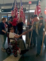 Commander Steve Whynot was one of the crowd helping to sendoff veterans at an Honor Flight event in June (image from Facebook)