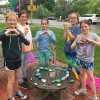 Anna McCarthy, Joely Stewart, Maya Regan, Scarlett Gobron, and Maddy Wall deliver Kindness Rocks to the Southborough Library and Senior Center