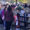After the march, many stopped at the Friends of the Library Book Sale (by Beth Melo)