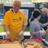 Rotary Club held its annual fundraiser selling Dominoe's pizza on the field (from Rep. Carolyn Dykema's Facebook post)