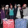 Girl Scouts collect contributed gifts at the annual event.