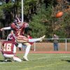 Alexis Kelin kicks a field goal (photo by Owen Jones Photography)