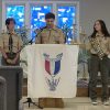 Zalev's older brother Anthony led the Eagle Scout Charge flanked by Cass Melo (left) and new Eagle Scout Ariella (right) - photo by Joao Melo
