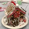 Gingerbread houses from workshops in prior years (photos edited from Facebook posts)