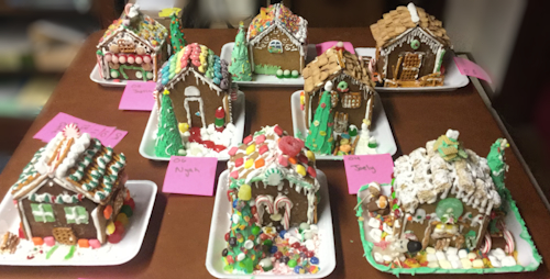 Gingerbread houses from workshops in prior years (photos edited from Facebook posts)