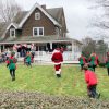 Santa and helpers head to the Community House to hear kids' wishes (photo by Beth Melo)