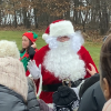 Santa greets crowd (photo by Beth Melo)