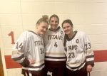 ARHS Girls Hockey's Captain Emily Johns (right) with Assistant Captain Lauren O'Malley (left), and Captain Bryn Domolky (center) - image cropped from photo by Laney Halsey
