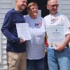 Jamie Falconi (left) and Alan Diodato (right) with longtime resident Bea Ginga - Southborough's "unofficial mayor" who cut the ribbon at the Grand Opening. (Contributed photo)