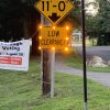 River St bridge RR low clearance crossing sign contributed by John Kendall