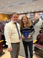 Library Director Ryan Donovan presented the service award to Kim Ivers (contributed photo)