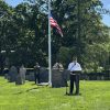 Commander Whynot speaking in the Old Burial Ground