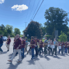 Trottier band marching in procession