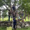 Volunteers who installed 9th Letter of the Alphabet Portraits” installation with teacher, Denise Johnson (L to R): Chase Walter, Jake Walter (on ladder), Desiree and Lyla Azzalina, and Tye Walter. (photo contributed by Denise Johnson)