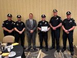 Officer O'Brien with fellow members of the SPD and Town Administrator Mark Purple at reception (contributed photo)