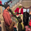 A grinchy visitor entertained kids in line waiting to see Santa (photo contributed by Southborough Kindergroup)