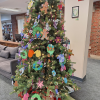 Library tree covered with ornaments made by children at the annual party (photo by Kim Ivers)