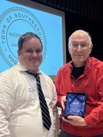 Bert McCue receives Peggy Tuttle Service award