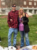 Johnson with her grandson at the Earth Day lunch