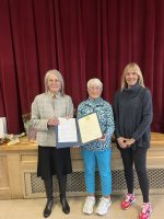 Select Board member Marguerite Landry (left) presented a certificate to Marjorie Coldwell (center), flanked by long-time pantry volunteer Karen White (right). (contributed photo)