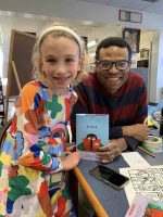 Jonathan Toddd, author of Timid, with a participant of the a spring 2025 comics workshop at the Library (from Facebook)