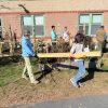 Volunteers help install new garden fence at Finn (contributed photo)